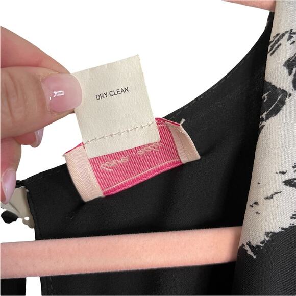 Love…Ady Black and White Floral Long Sleeve Romper - Picture 6 of 7